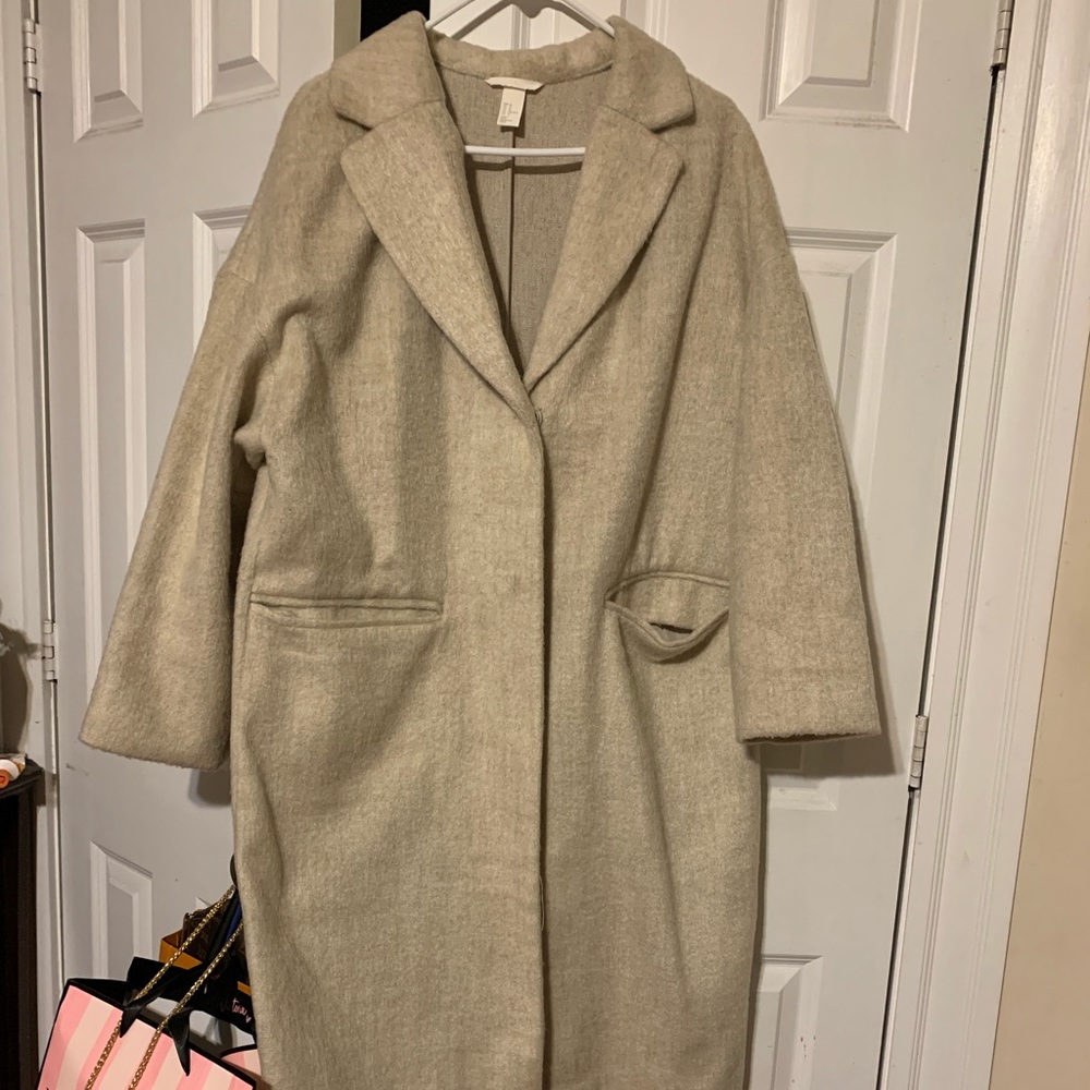 A cream wool pea coat